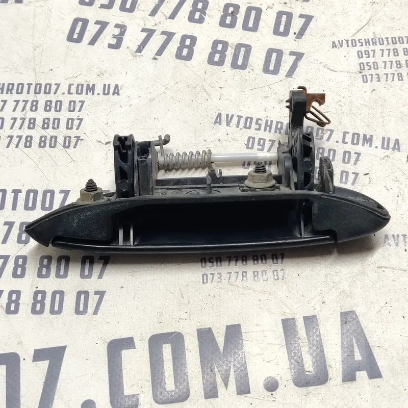 Ручка зовнішня Dacia Logan (04-12) 1.6 ліва OEM 7700433076