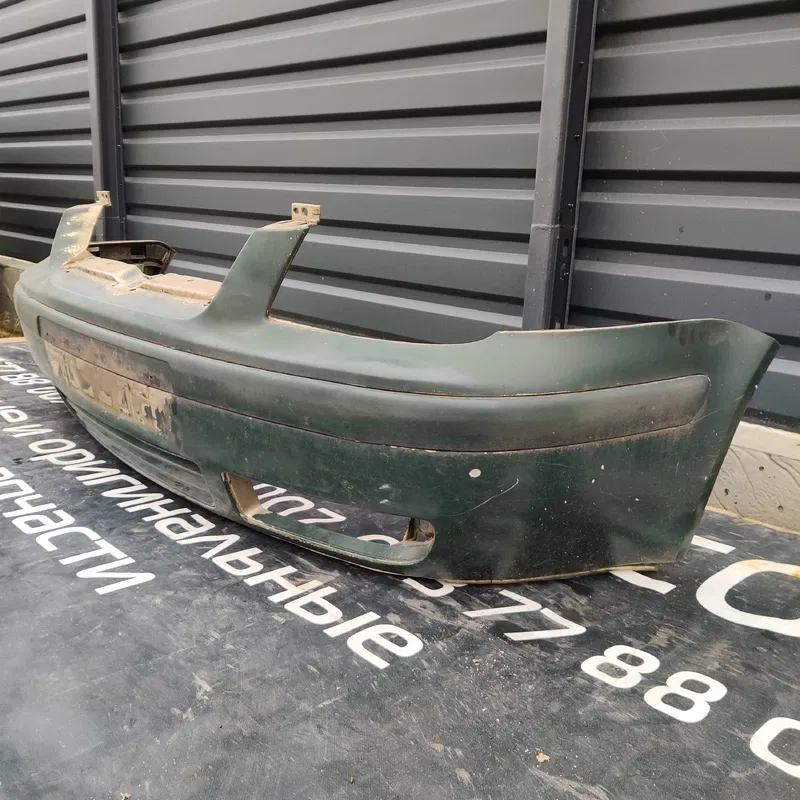Бампер VW Bora (98-05) 1.9 TDI передній OEM 1J5807231