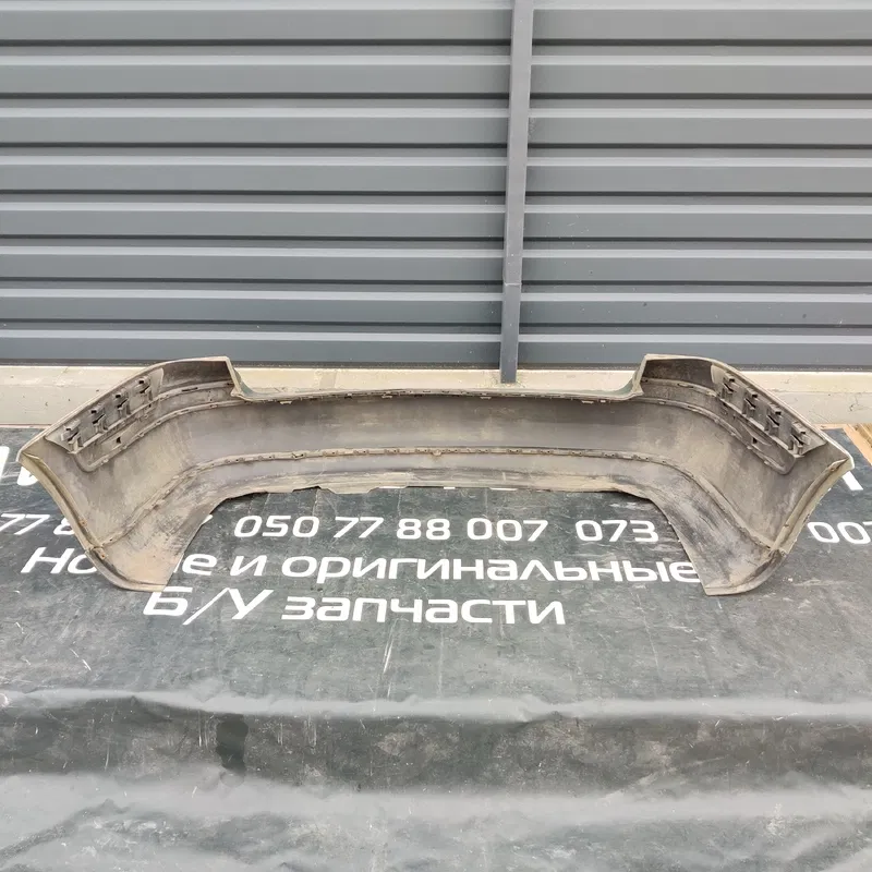 Бампер Volkswagen Bora (98-05) 1.9 TDI задній OEM 1j9807421
