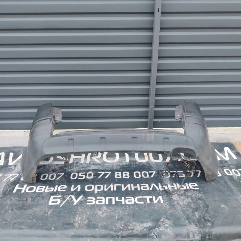 Бампер Mitsubishi Outlander XL (06-12) 2.0 Дизель задній
