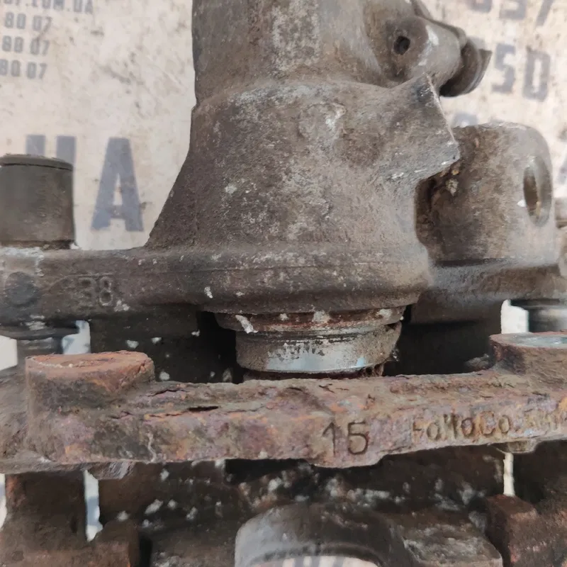 Тормозний супорт Mazda 3 BK (03-09) зад. лівий OEM 15F0M000