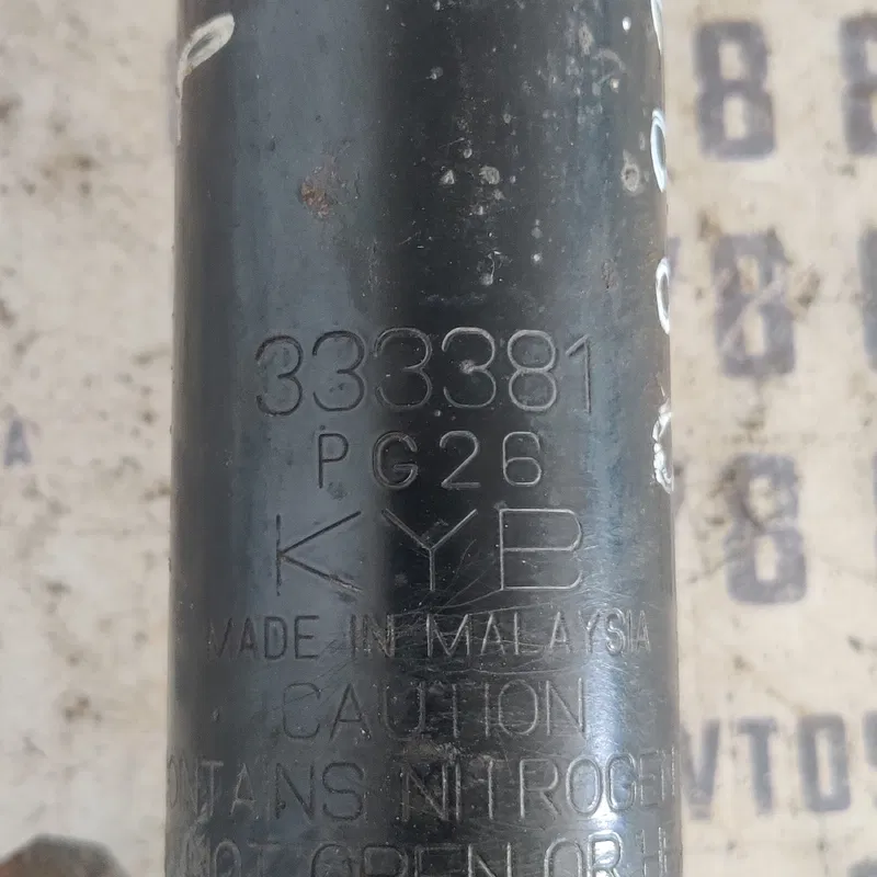 Амортизатор Mitsubishi Lancer 9 (03-08) передній OEM 2333381