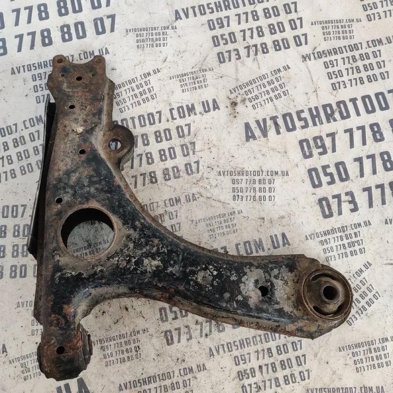 Ричаг підвіски VW Passat B3 88-93 перед. лівий OEM 357407157