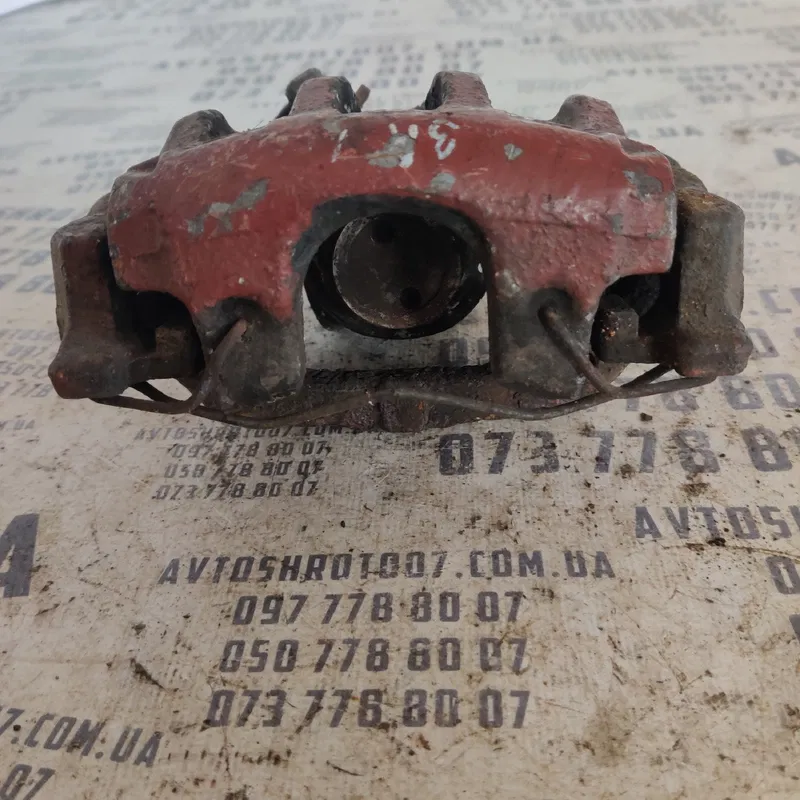 Тормозний супорт Mazda 3 BK (03-09) зад. лівий OEM 15F0M000