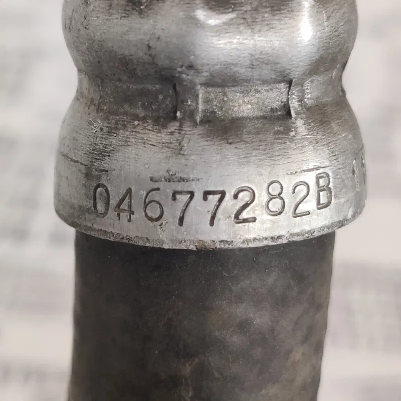 Трубка кондиціонера Chrysler Voyager 3 (95-00) OEM 04677282b