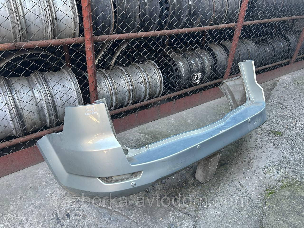 Бампер задній (з парктроніками) універсал Ford Mondeo (07-10) доресталінг OE:7S71N17906A