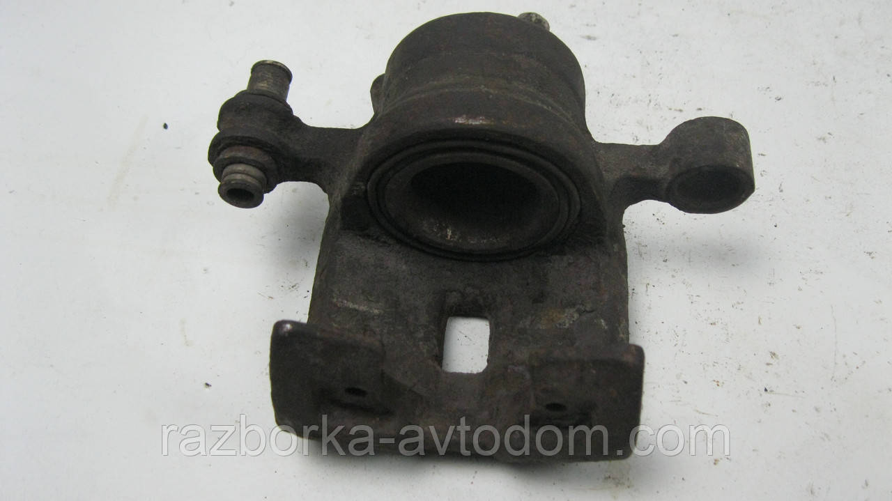 Суппорт передній лівий Mazda 626 GC (1983-1987) OE:G09133980