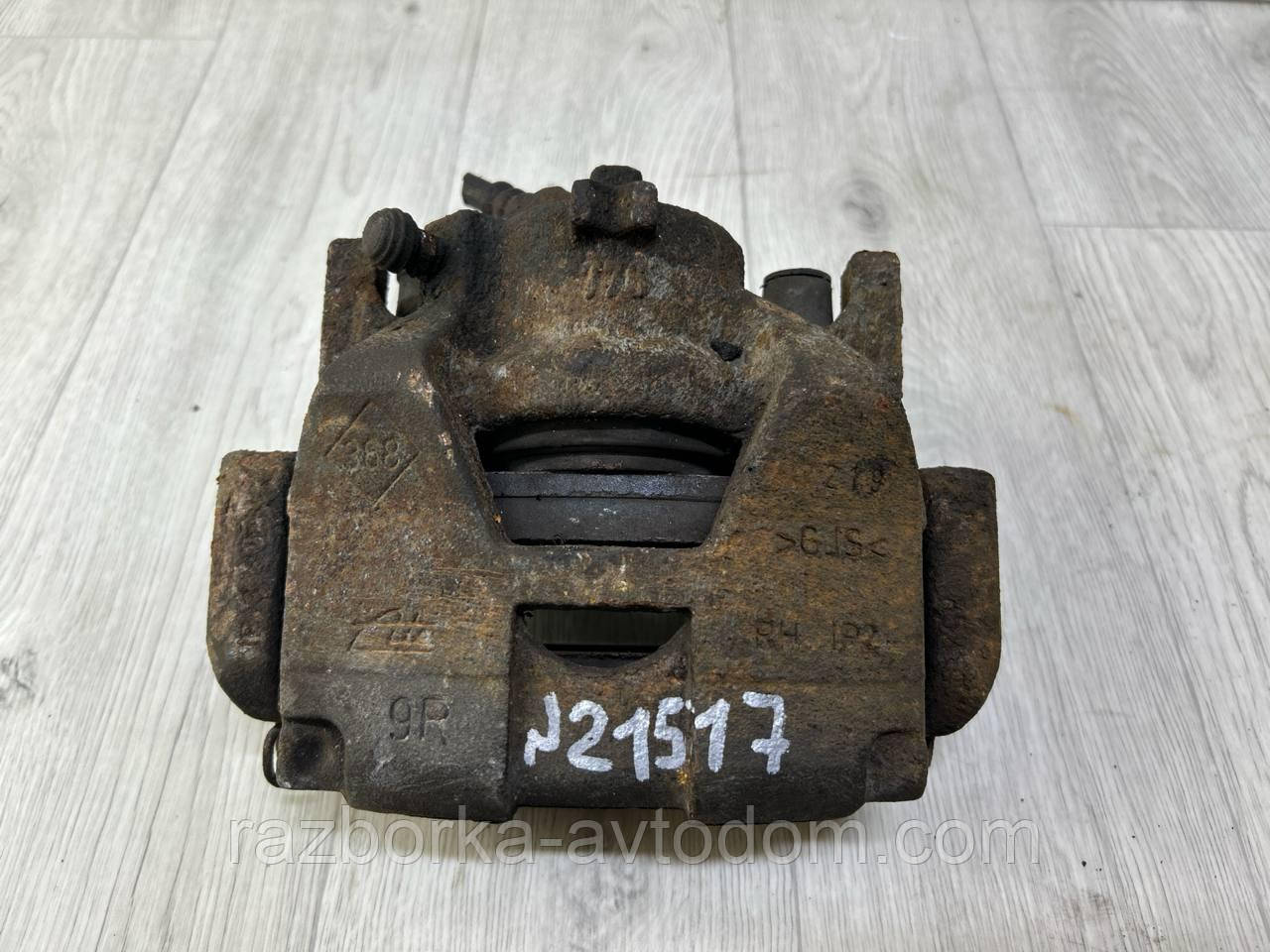 Суппорт передній правий Renault Scenic 3, Grand Scenic 3, Laguna 3 OE:410010001R