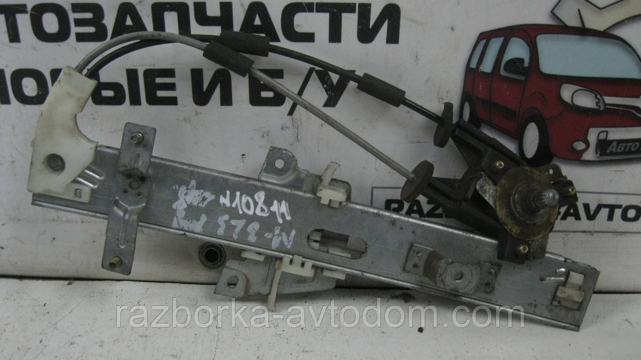 Склопідіймач задній лівий (механічний) Mazda 323 BG (1989-1994) OE:B455-73-560B