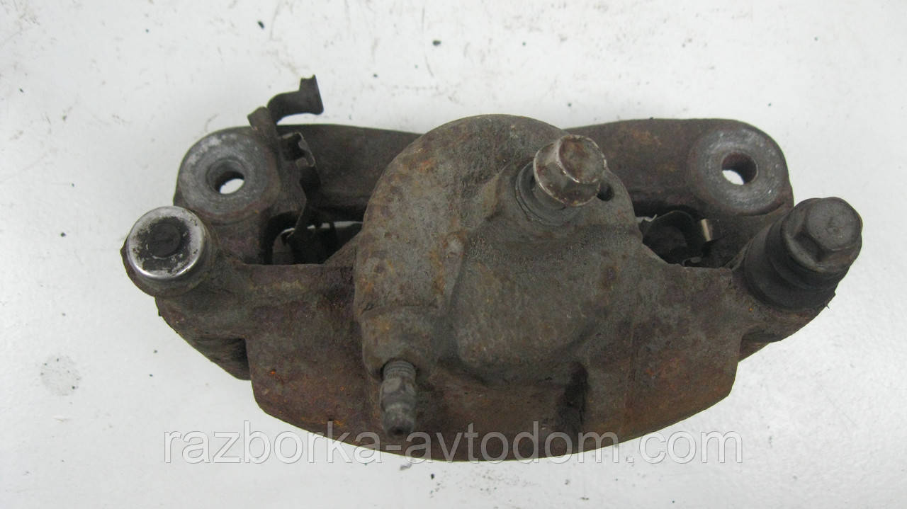 Суппорт передній правий Mazda 626 GD (1987-1991), 626 GV (1988-1994) OE:G23533980B