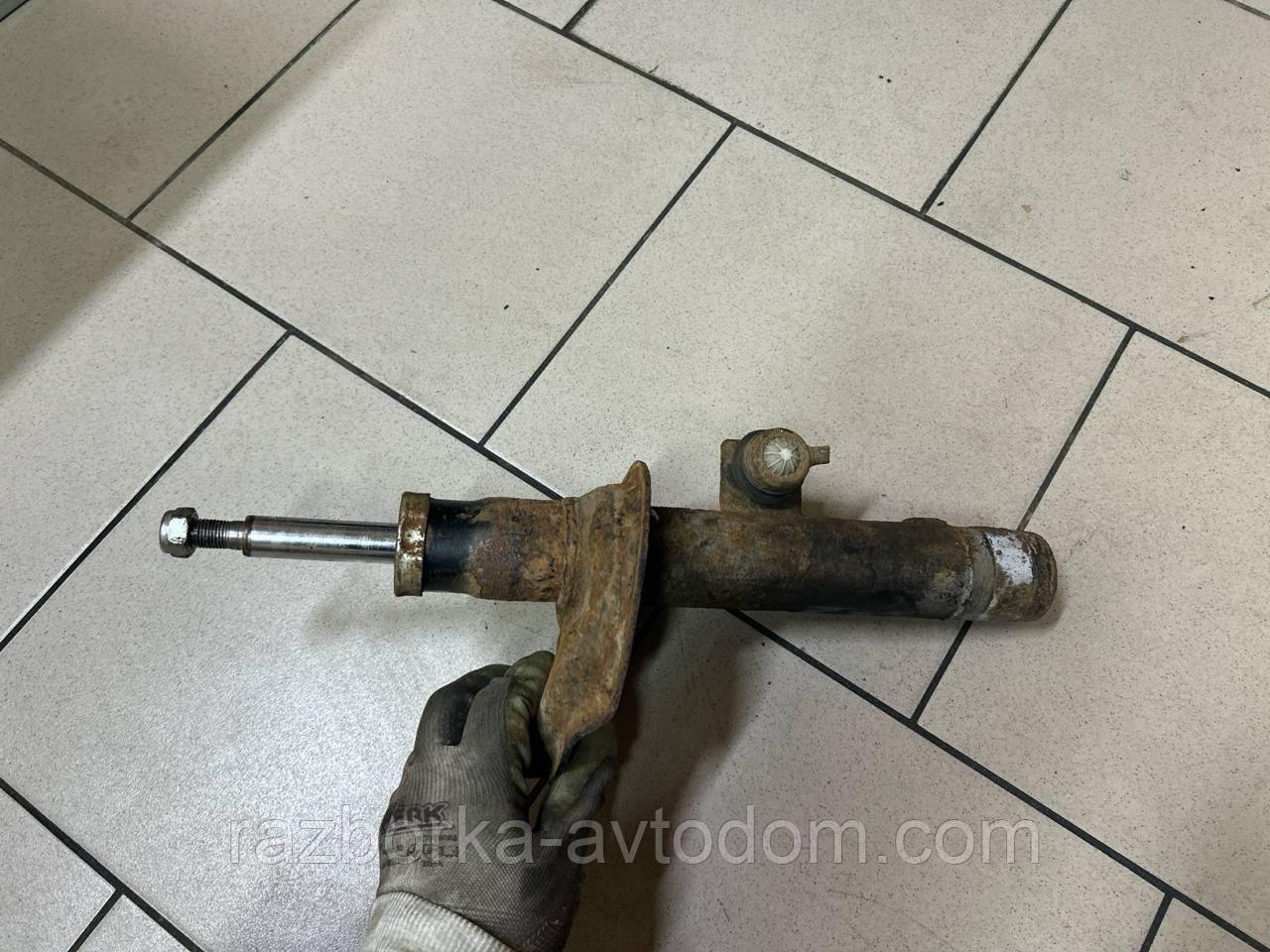 Амортизатор передній лівий Citroen Berlingo (03-08), Peugeot Partner (03-) OE:5202GP