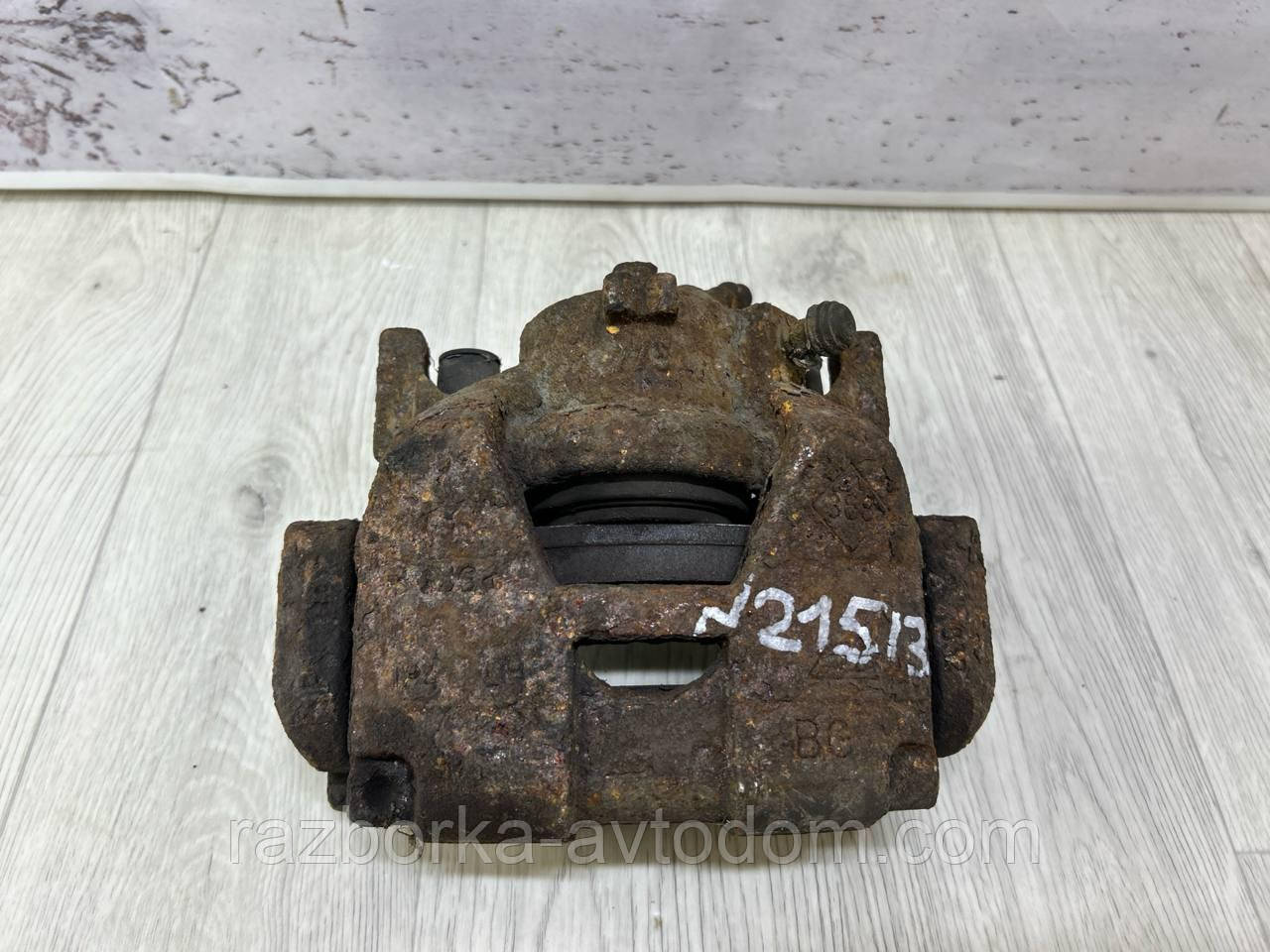 Суппорт передній лівий Renault Scenic 3, Grand Scenic 3, Laguna 3 OE:410110001R