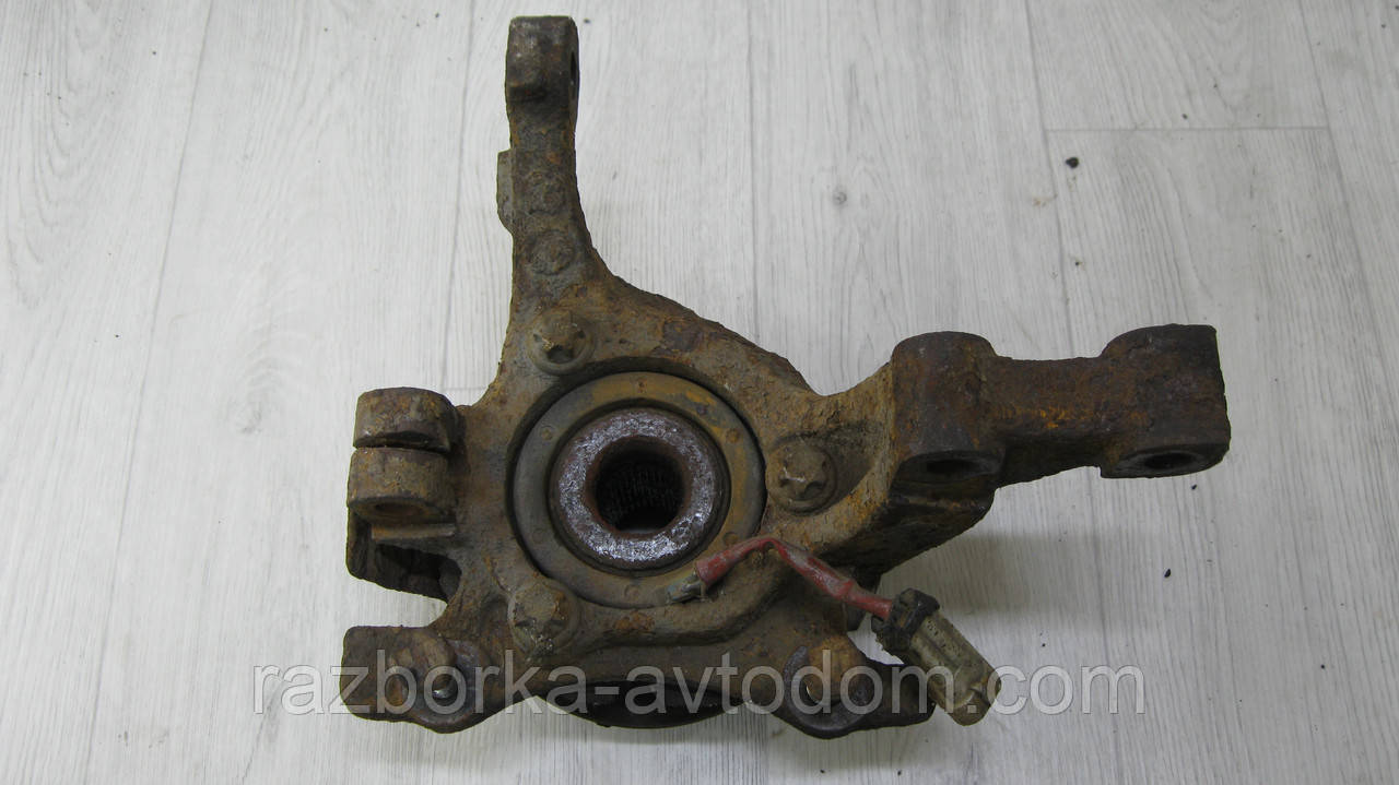 Поворотний кулак передній лівий (ступиця/дряпфа) Opel Zafira A (1999-2005) OE:13165671, 9117620