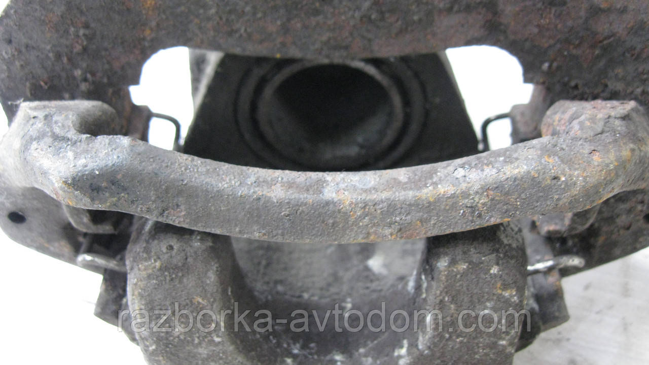 Суппорт передній лівий Fiat Uno, Panda, 131, Lancia Y10 OE:99552577